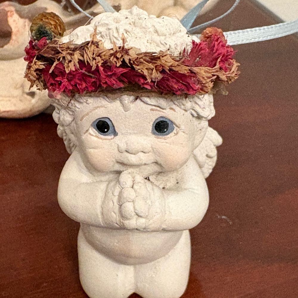 Charming Cherub Figurine with Red Floral Crown